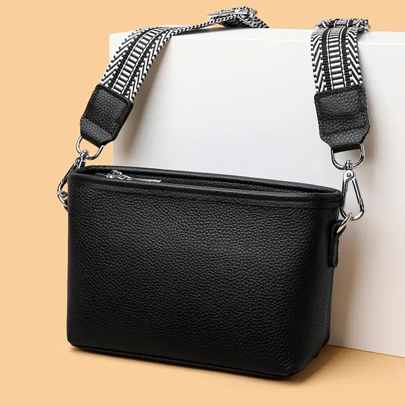 Wide Strap of Heritage Cross Body Bag – Close-up view of the wide leather strap designed for comfort and style.