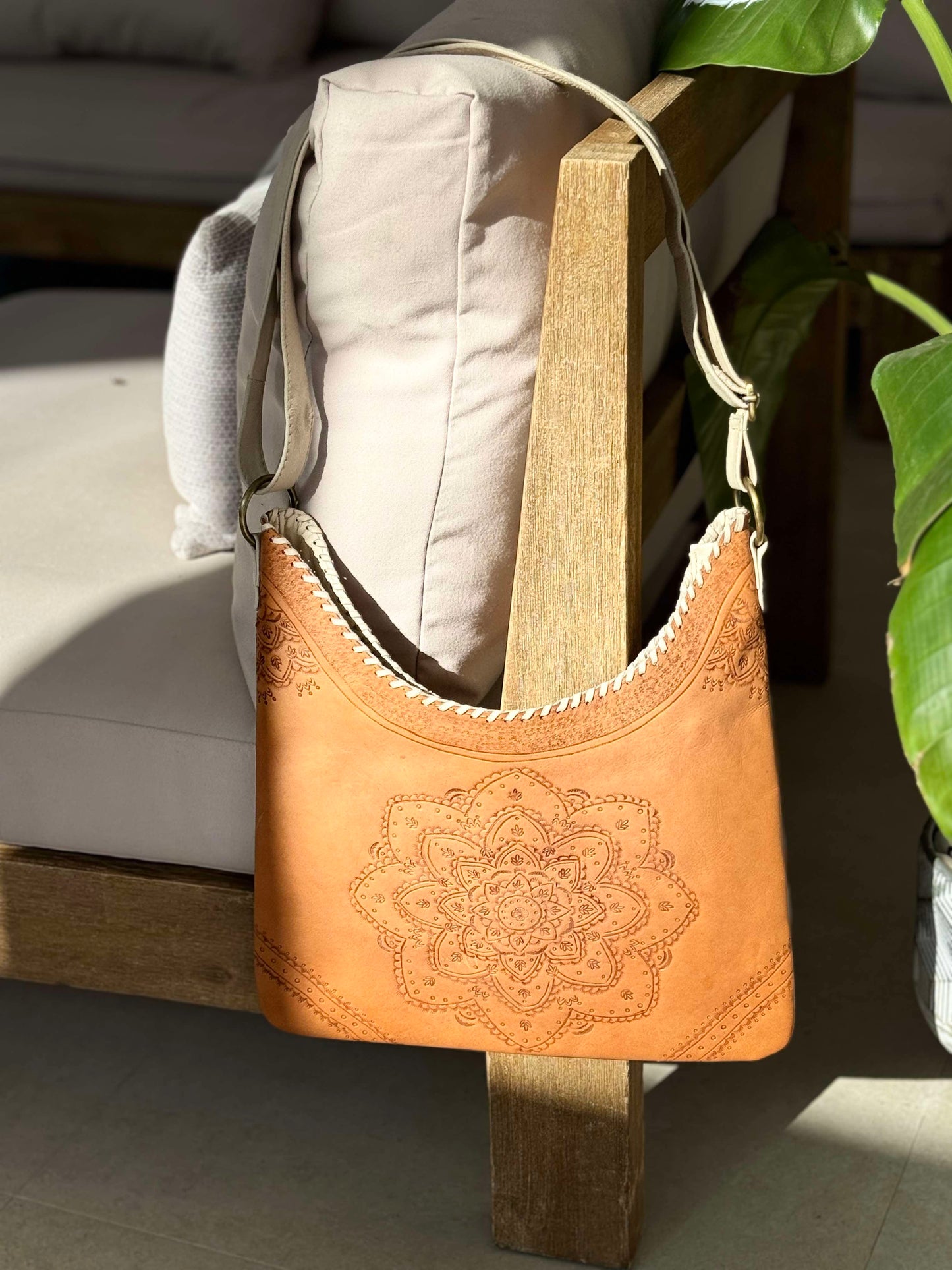 Boho-chic Sienna Mandala Leather Tote, featuring hand-tooled mandala patterns and spacious interior.