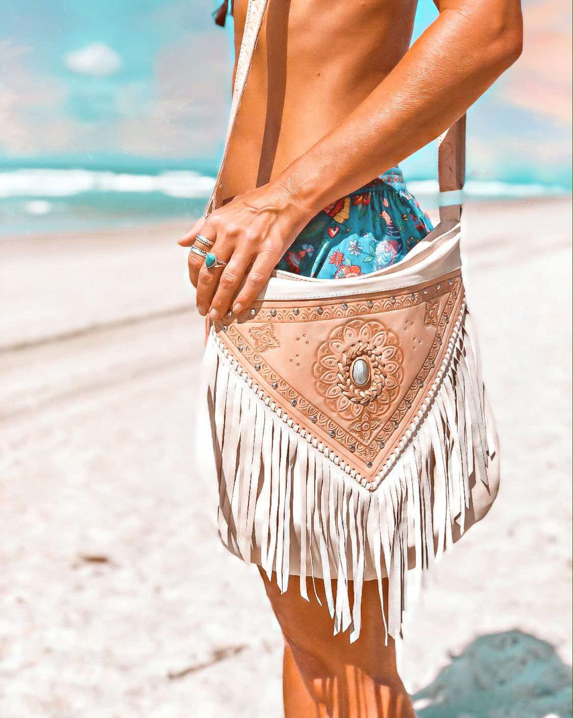 Close-Up of Aurora Fringed Bag’s Fringing and Leather Detail
Close-up view highlighting the intricate fringing and high-quality leather of the Aurora Fringed Bag.