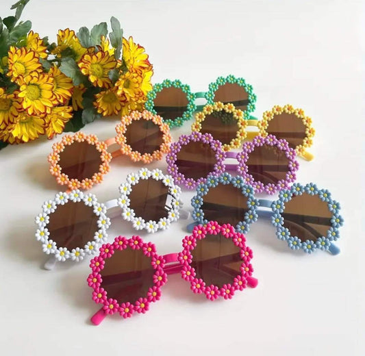 Cute daisy sunglasses for toddlers with white petals and yellow center in Australia.