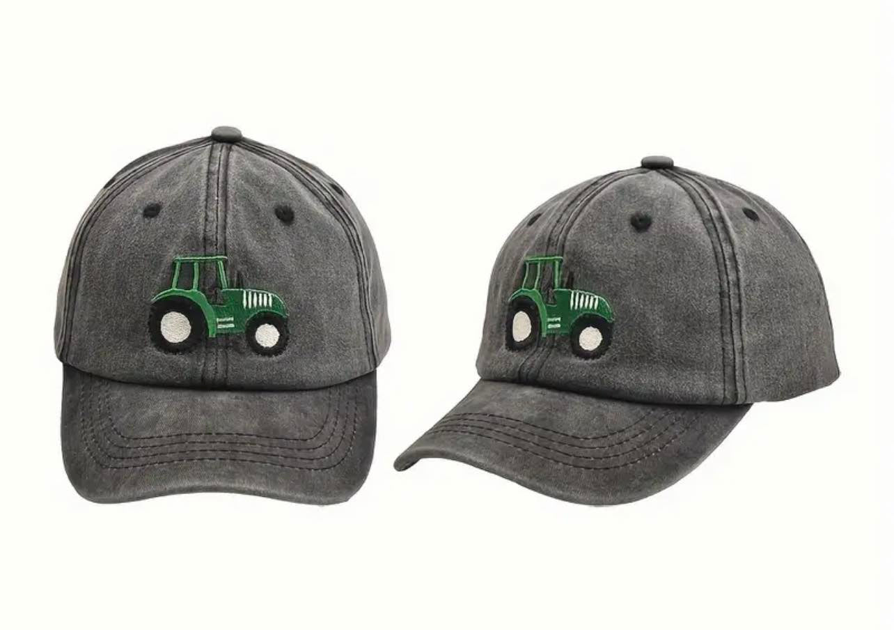 Front view of the Retro Tractor Vintage Washed Baseball Cap for kids featuring a playful tractor graphic