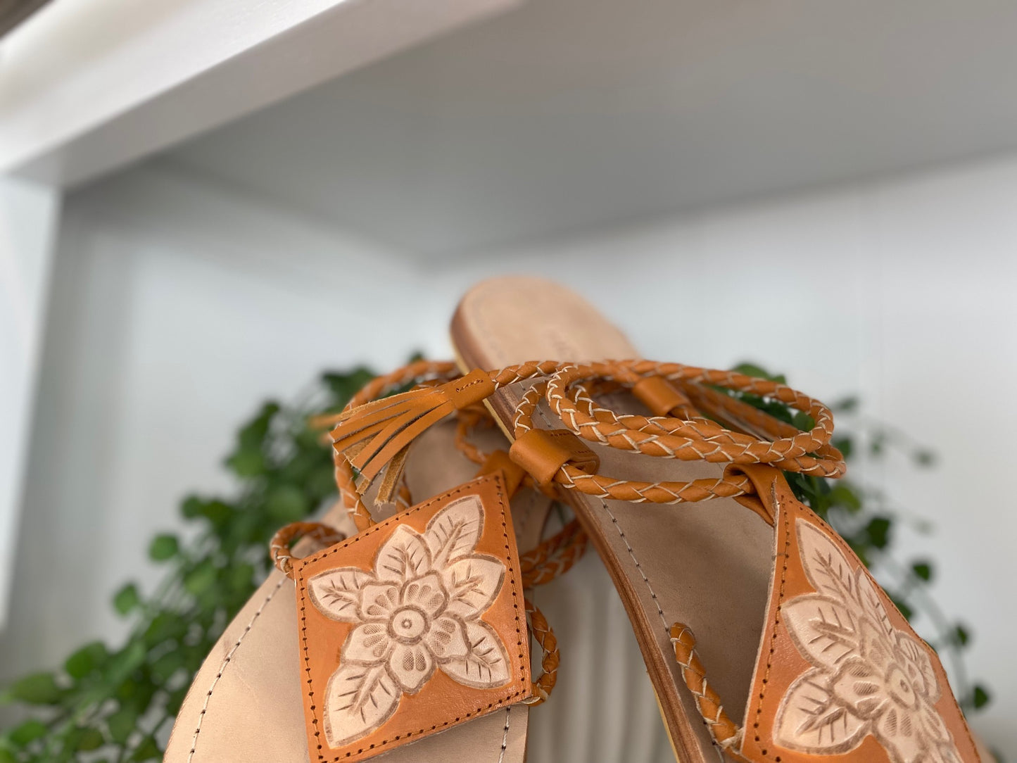 Flat lay of Leather Rope Strap Sandals for Women, featuring a chic and stylish hand-braided leather strap design with a refined touch.