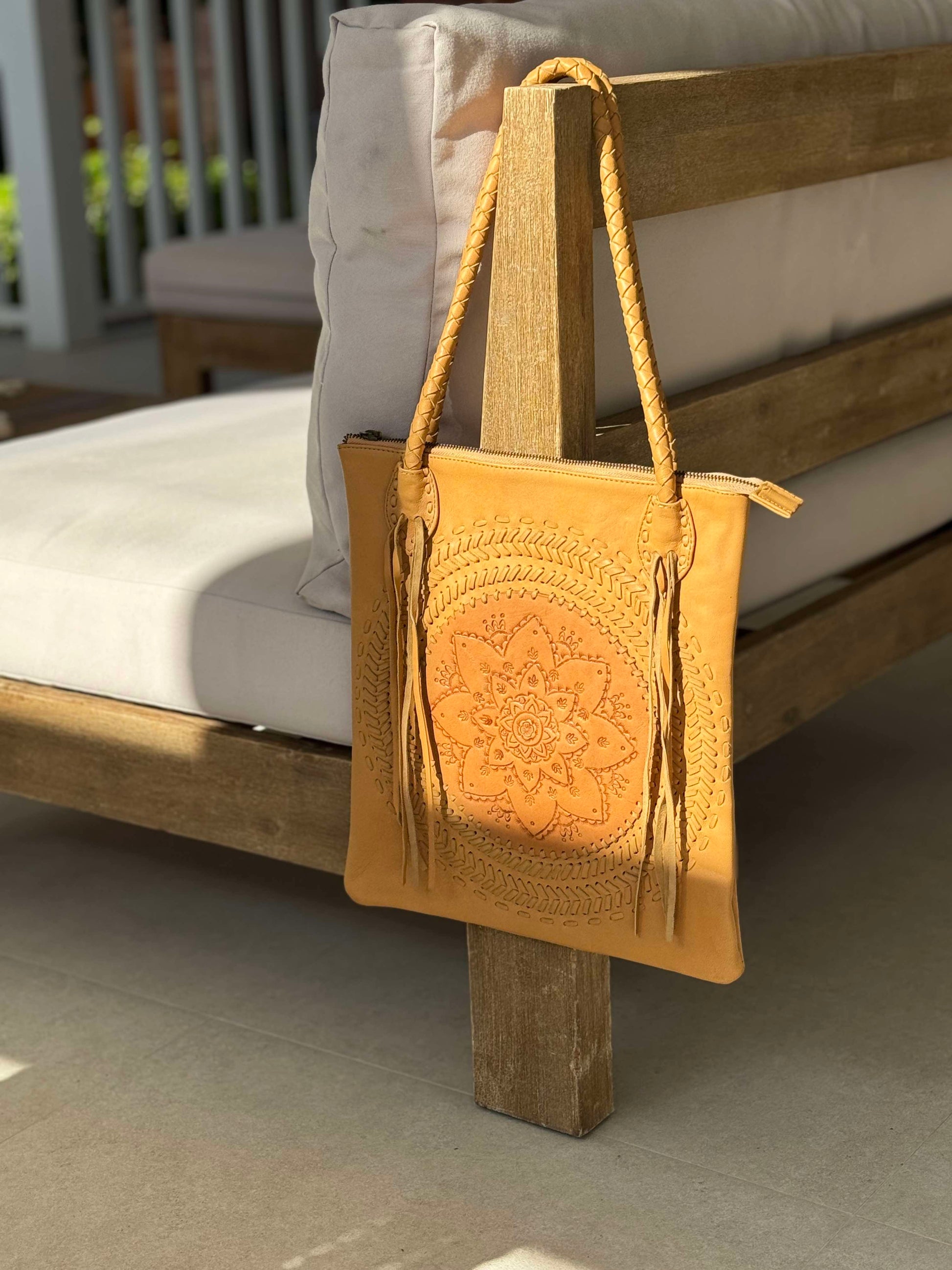 Hand-tooled leather shoulder bag with braided straps, fringe, and a rope handle, "Wildflower," vintage-inspired boho bag.