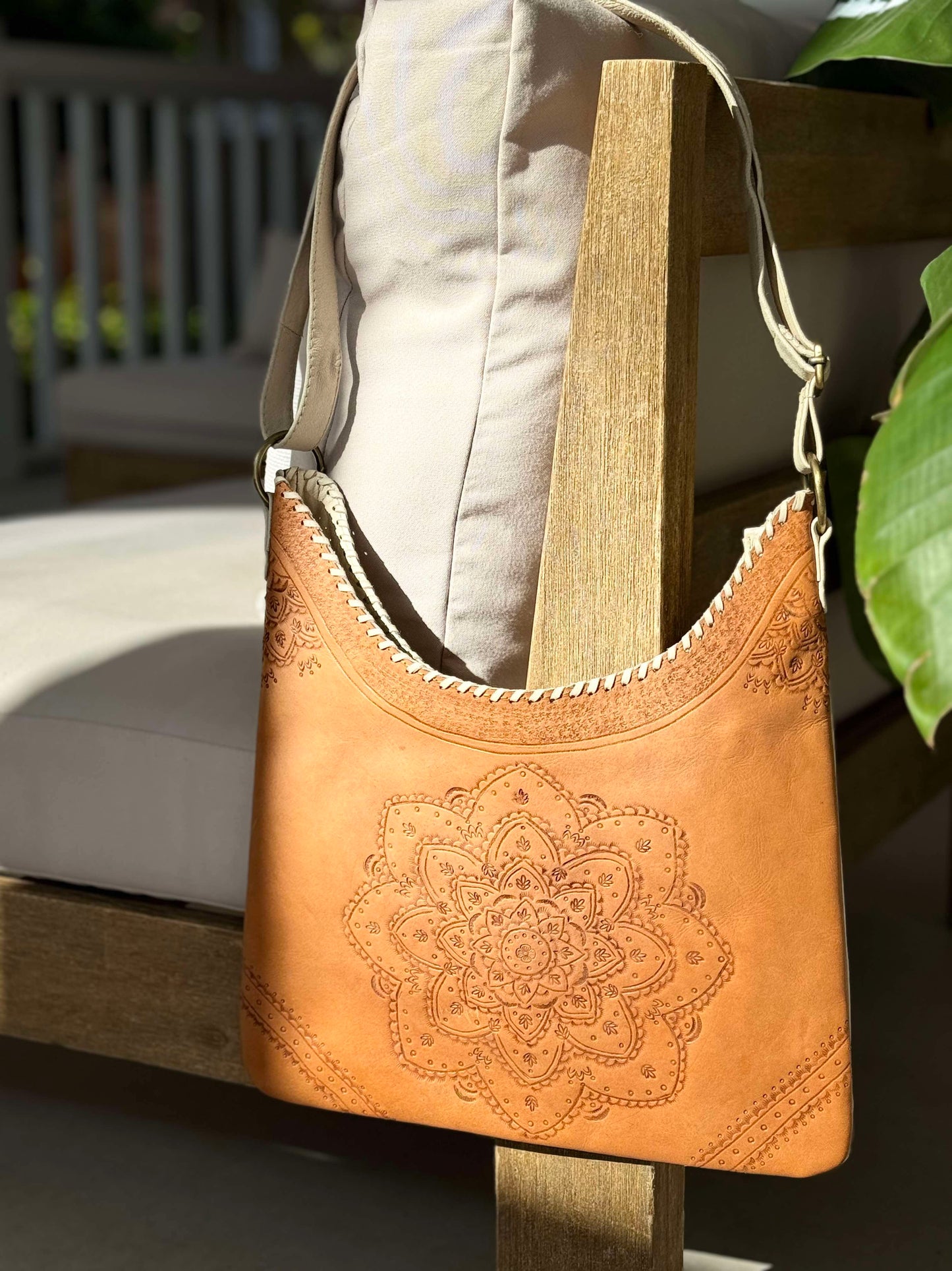 Sienna Mandala soft genuine leather tote bag in Antique Brown with hand-tooled details and braided shoulder straps.