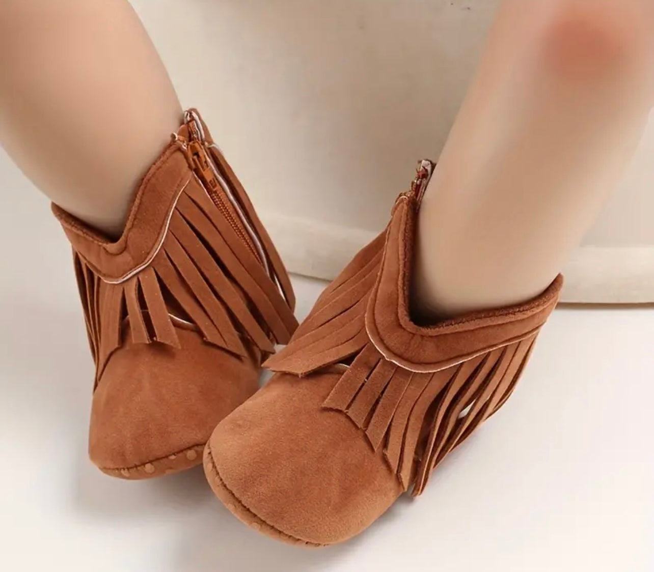 Soft and comfortable cowboy-style baby boots with tassels, made from plush cotton. Choose from Beige, Pink, Brown, or Dark Grey for a cute, cozy look