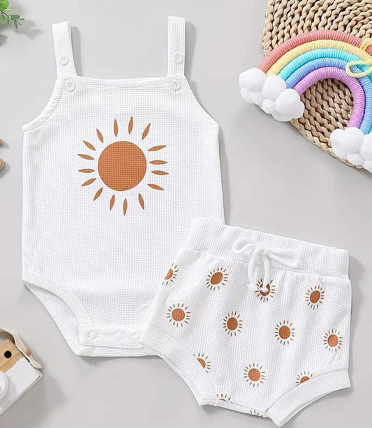 Baby girls' sun graphic print onesie and matching shorts set in a vibrant, playful design, perfect for summer days.