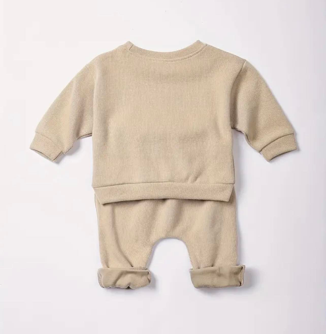 Sunset Set Kids Slouch Trakkie featuring a cozy, soft rainbow emblem sweater.